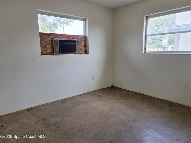 an empty room with a window