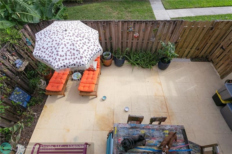 2929 Southwest 22nd Circle, Unit 32B Delray Beach, FL 33445 - Photo 19 of 22 a view of outdoor space and garden