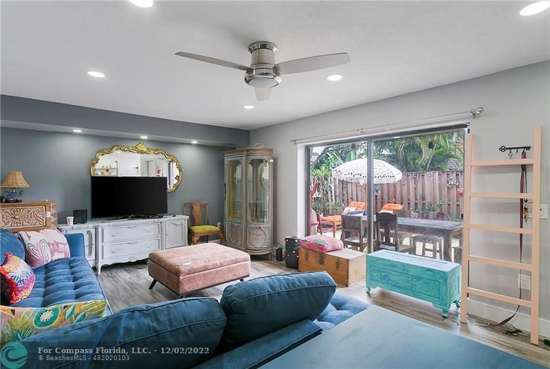 2929 Southwest 22nd Circle, Unit 32B Delray Beach, FL 33445 - Photo 8 of 22 a living room with furniture and a large window