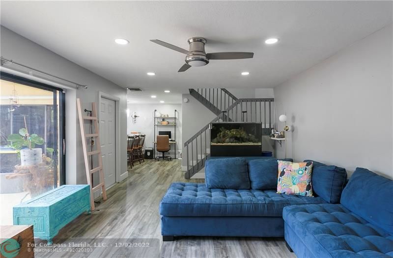 2929 Southwest 22nd Circle, Unit 32B Delray Beach, FL 33445 - Photo 10 of 22 a living room with furniture and a ceiling fan