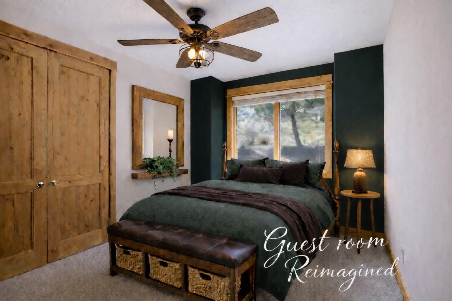 631 Sundance Ridge Court Redmond, OR 97756 - Photo 39 of 61 a bedroom with a bed and a chandelier