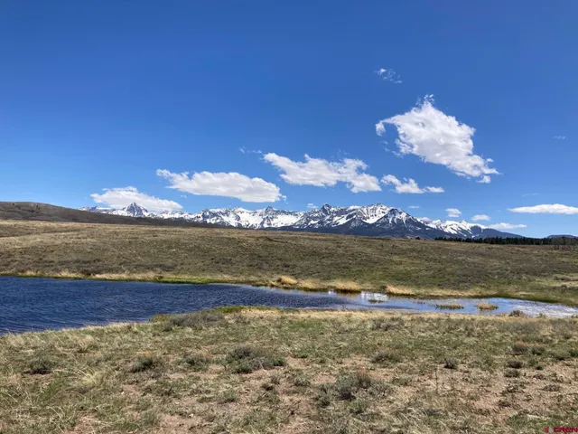 a view of a lake with a mountain