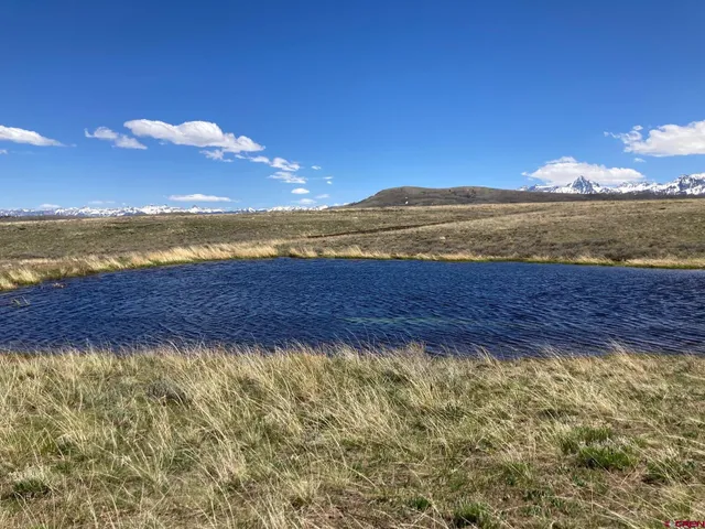 a view of a lake and mountain