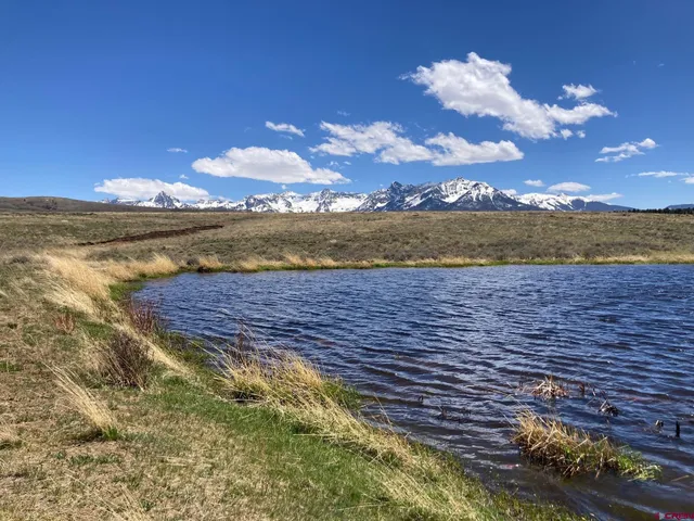 a view of a lake with a mountain