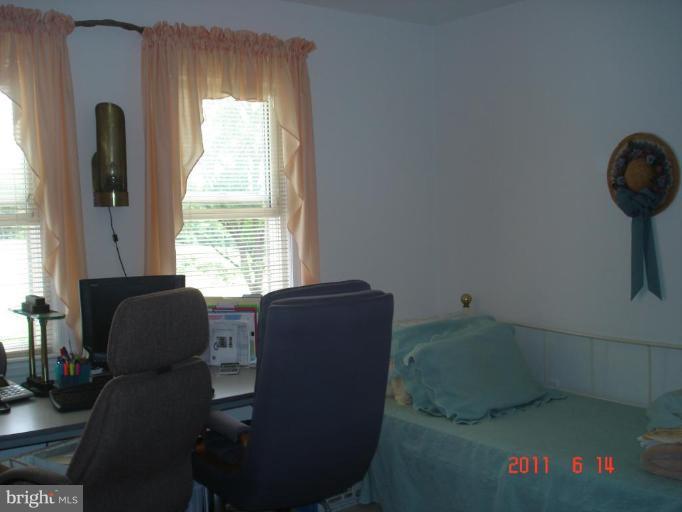 3317 Offutt Road Randallstown, MD 21133 - Photo 11 of 13 a living room with furniture and a window