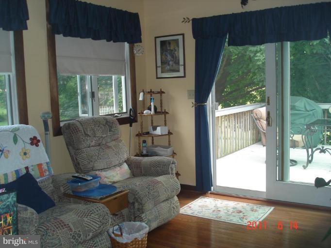 3317 Offutt Road Randallstown, MD 21133 - Photo 4 of 13 a living room with furniture and a large window
