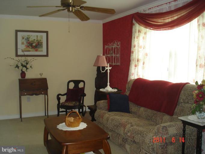 3317 Offutt Road Randallstown, MD 21133 - Photo 6 of 13 a living room with furniture and a window