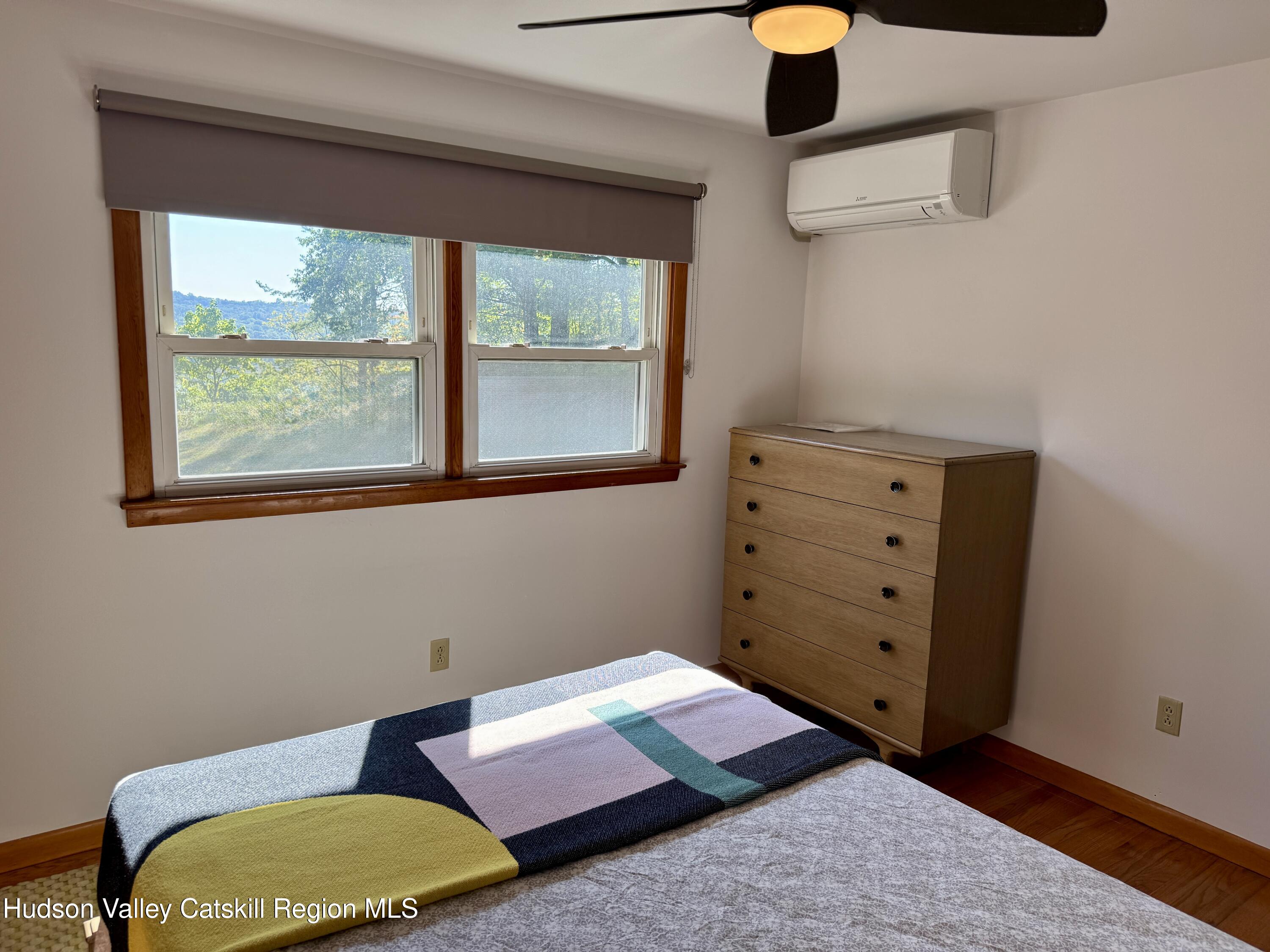 399 Hamburg Road Catskill, NY 12414 - Photo 19 of 23 a bedroom with a bed and a window