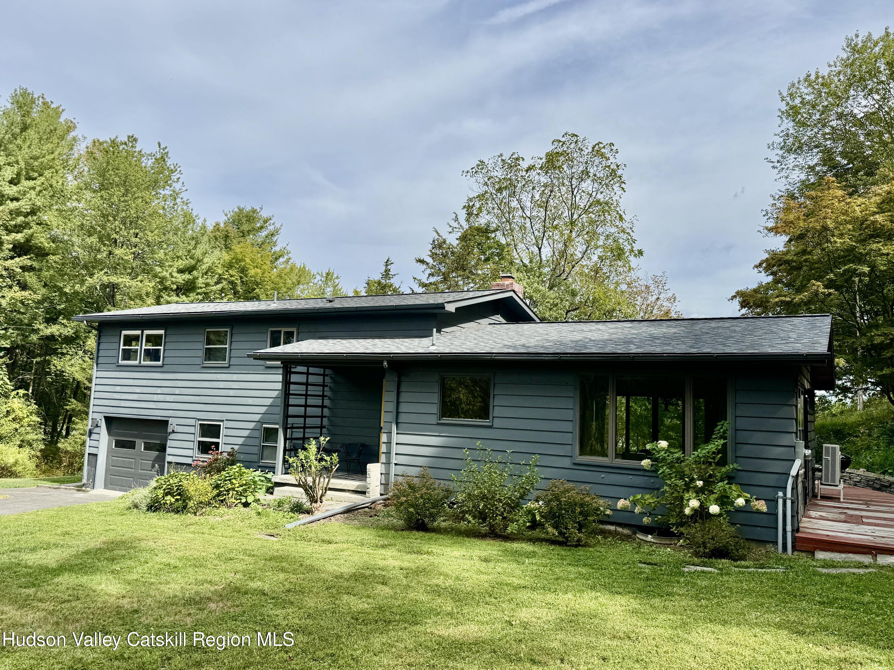 399 Hamburg Road Catskill, NY 12414 - Photo 2 of 23 a front view of a house with a yard