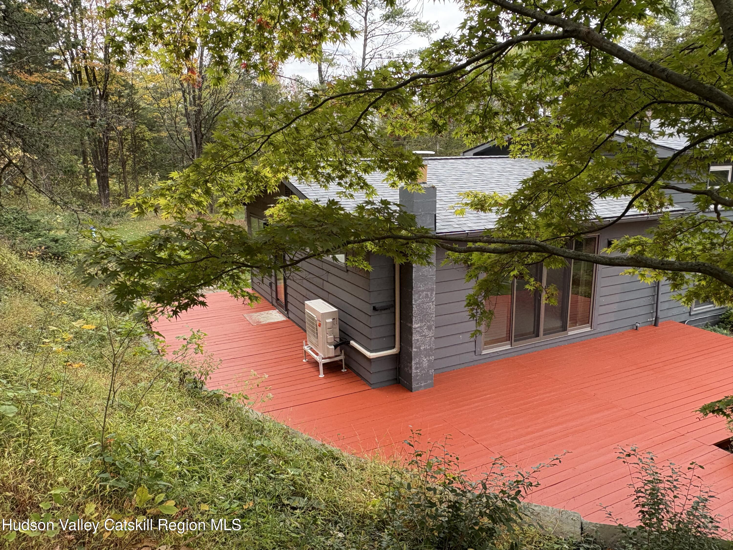 399 Hamburg Road Catskill, NY 12414 - Photo 22 of 23 a view of a lake with a house in the background