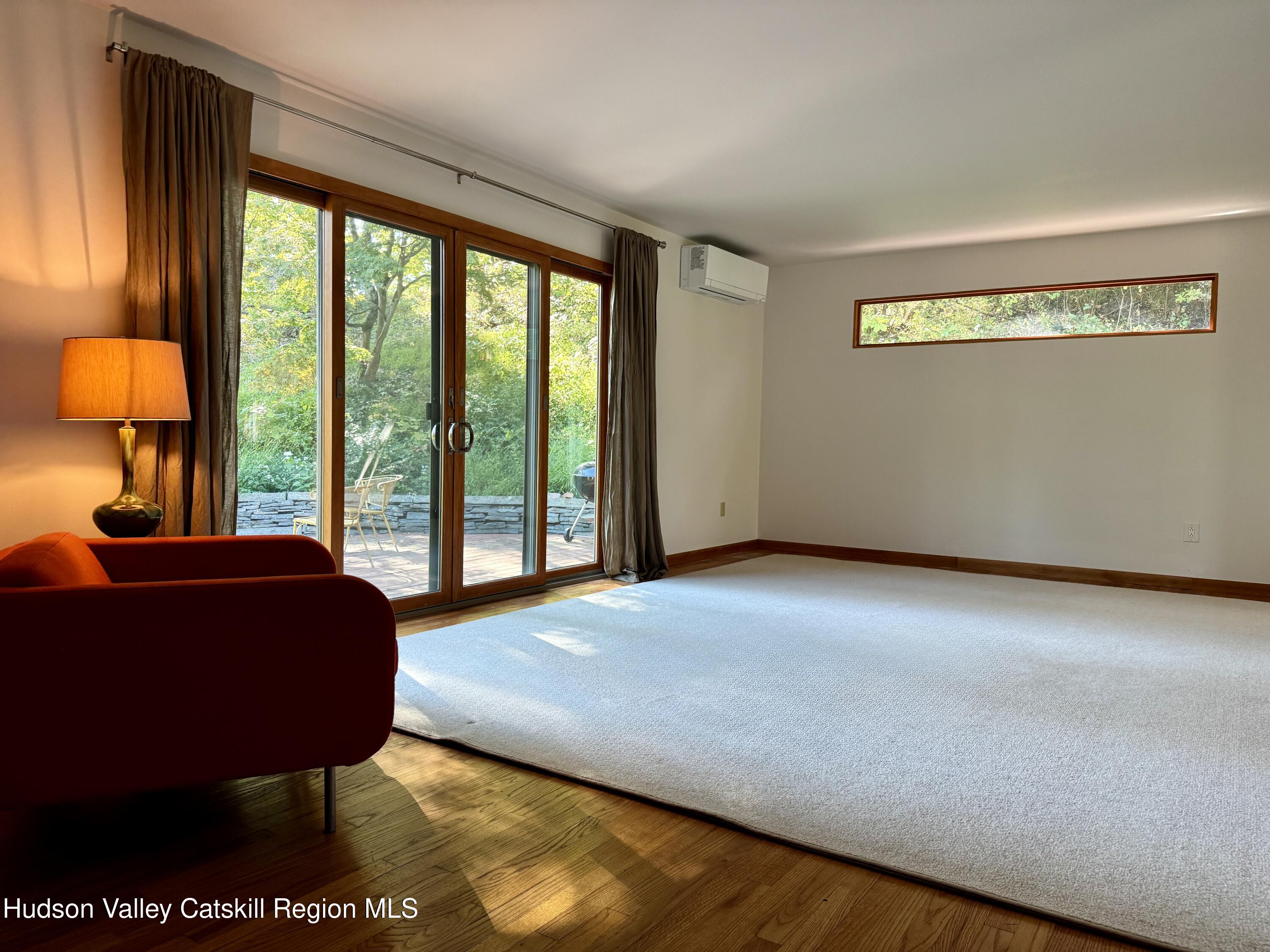 399 Hamburg Road Catskill, NY 12414 - Photo 6 of 23 a living room with furniture and a large window