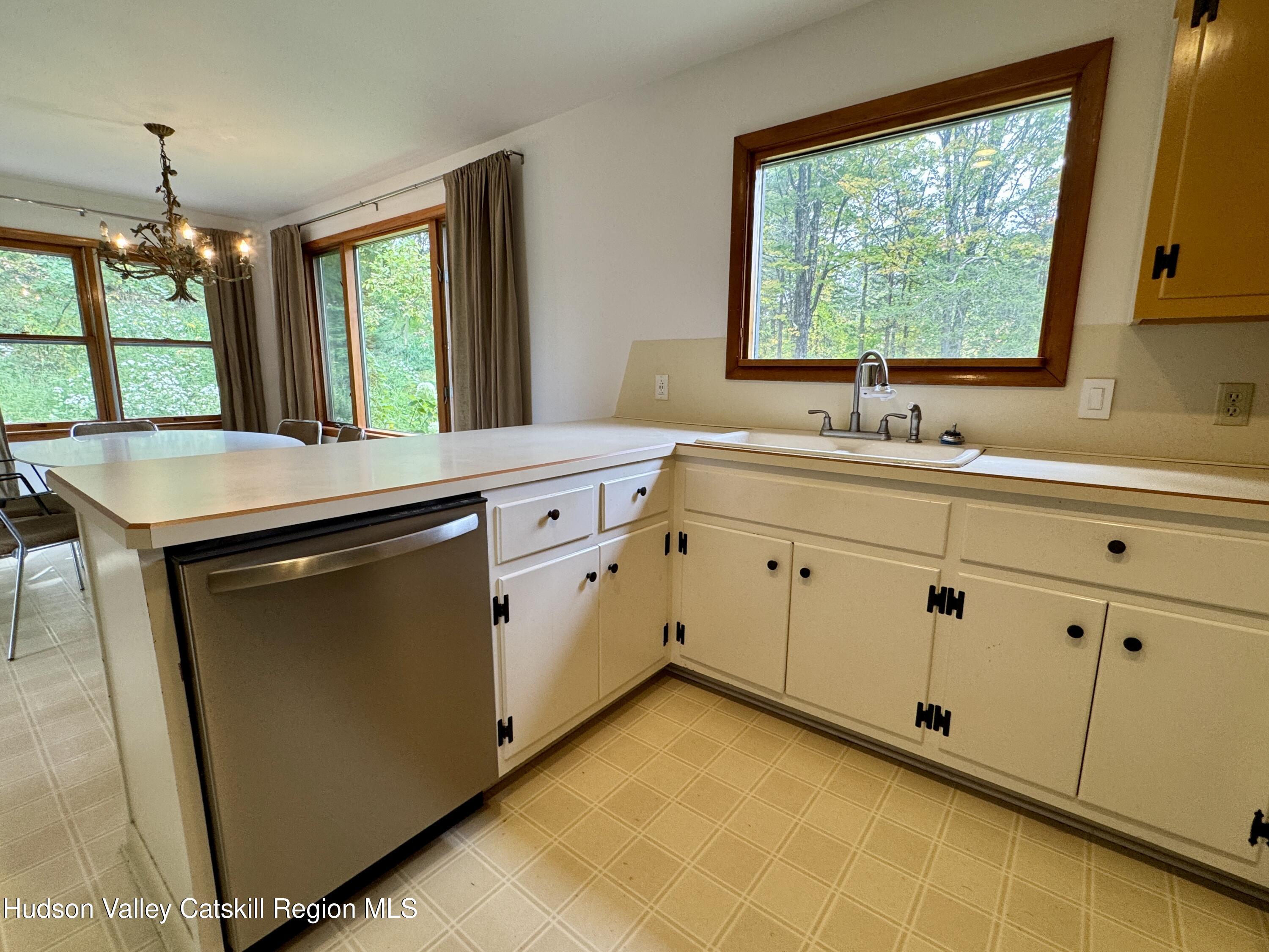 399 Hamburg Road Catskill, NY 12414 - Photo 10 of 23 a room with a window sink and mirror