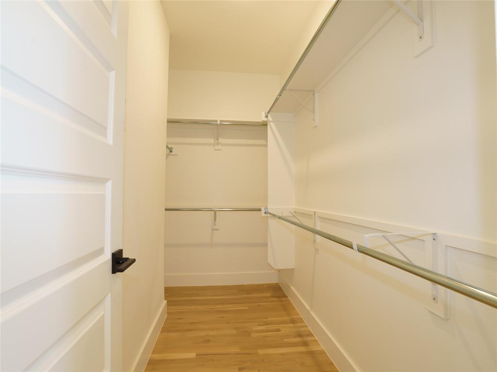 9311 Easy Street Rowlett, TX 75088 - Photo 13 of 22 Spacious closet featuring light wood-type flooring