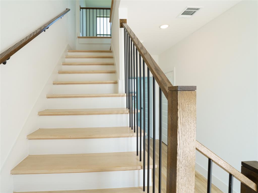 9311 Easy Street Rowlett, TX 75088 - Photo 17 of 22 Stairway featuring recessed lighting and wood finished floors