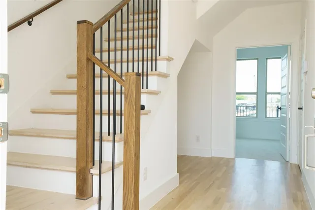a view of entryway with wooden floor