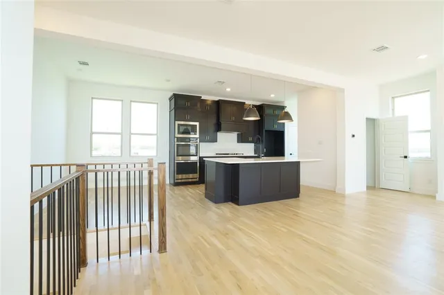 a view of kitchen with furniture and window