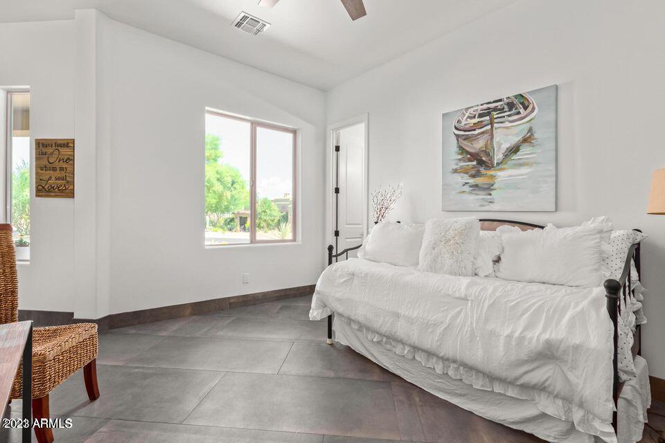 27808 Desierto Drive Rio Verde, AZ 85263 - Photo 27 of 44 a bedroom with a bed and a window