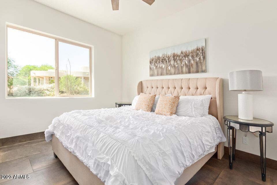 27808 Desierto Drive Rio Verde, AZ 85263 - Photo 30 of 44 a bedroom with a bed and a window