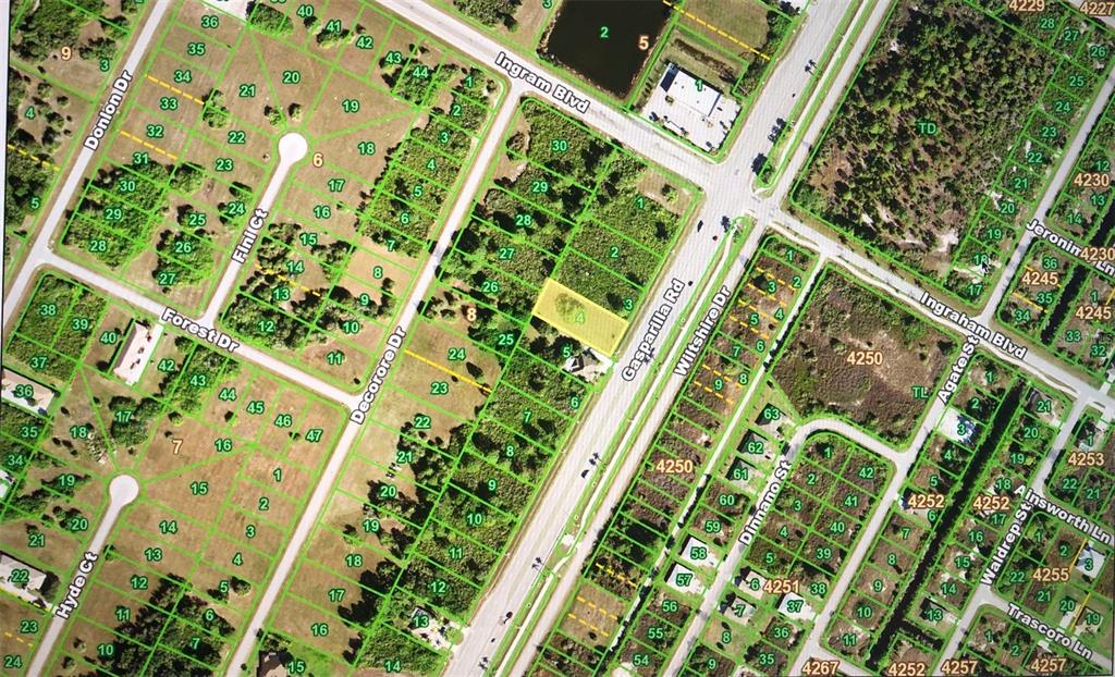 8465 Gasparilla Road Port Charlotte, FL 33981 - Photo 2 of 17 a close up of a plant