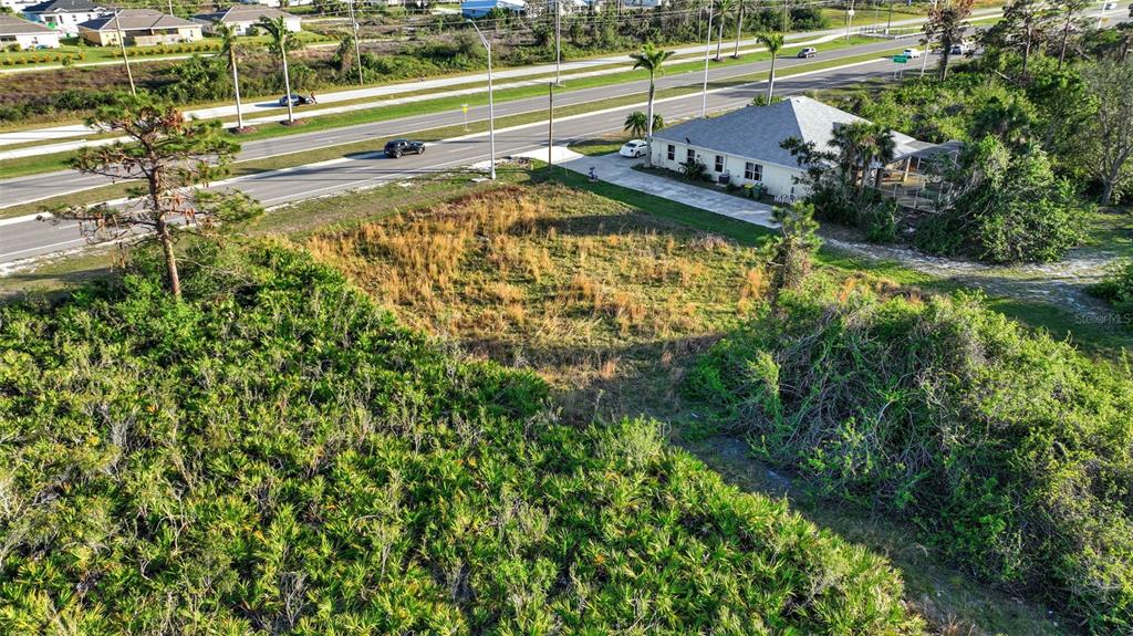 8465 Gasparilla Road Port Charlotte, FL 33981 - Photo 5 of 17 a view of swimming pool from a balcony
