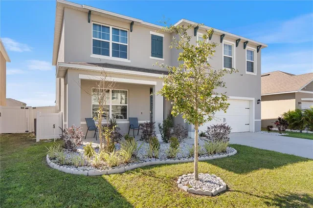 a house view with a garden space