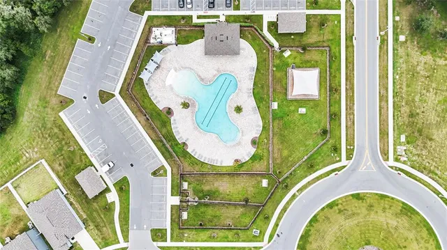 swimming pool view with a swimming pool