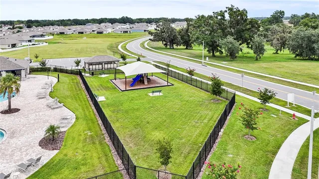 a view of swimming pool from a balcony