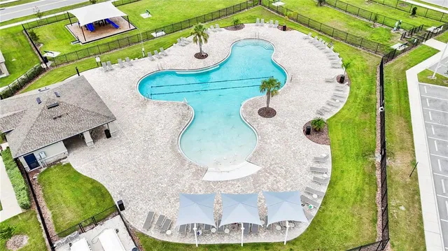 an aerial view of a swimming pool