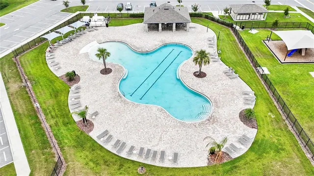an aerial view of a swimming pool