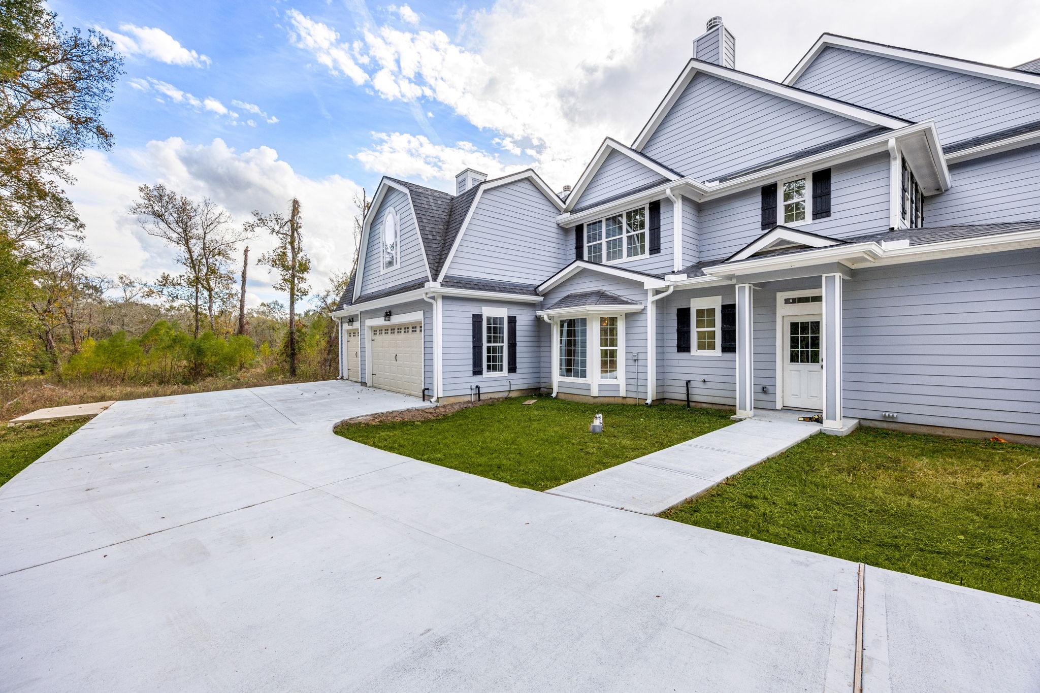 14882 Gingham Road Montgomery, TX 77356 - Photo 2 of 38 front view of a house with a yard