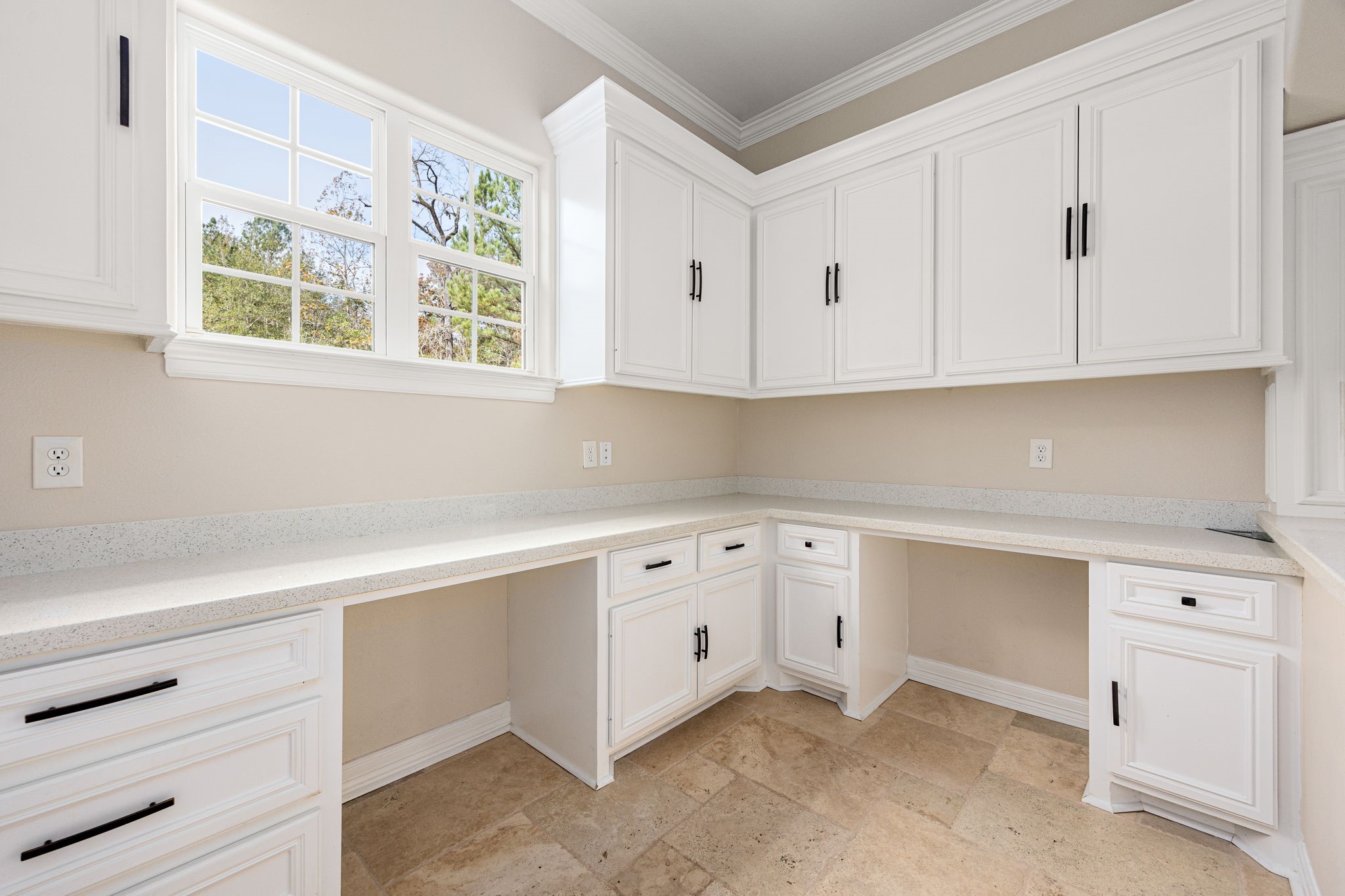14882 Gingham Road Montgomery, TX 77356 - Photo 22 of 38 a kitchen with white cabinets and a window