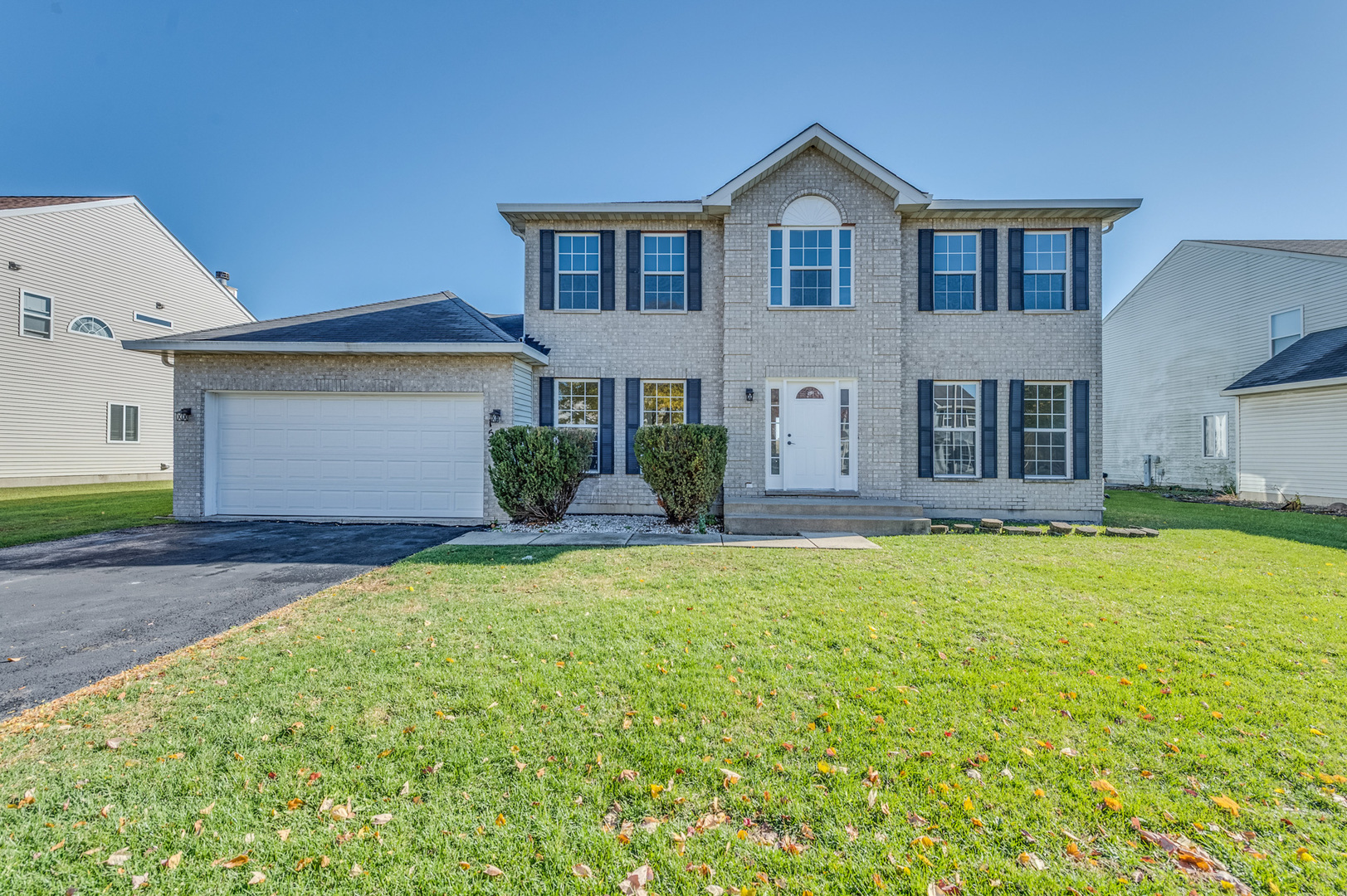 153 Treehouse Road Matteson, IL 60443 - Photo 1 of 19 a front view of a house with a yard