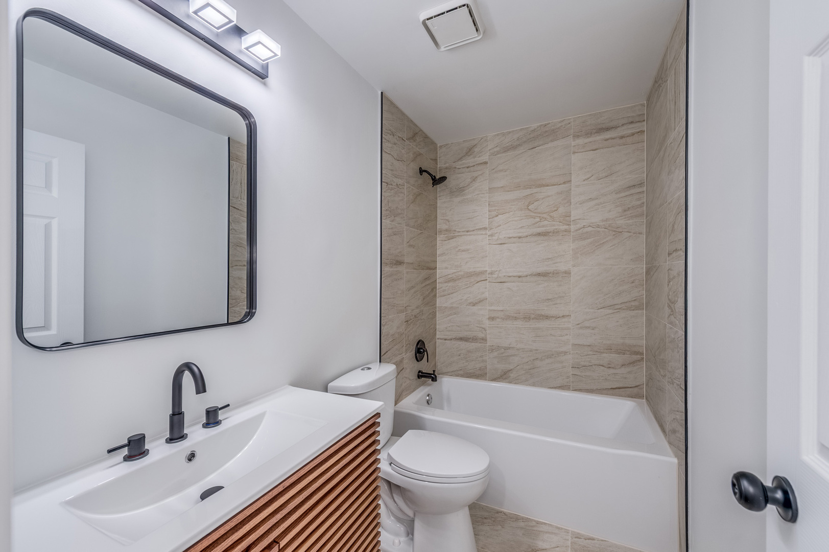 153 Treehouse Road Matteson, IL 60443 - Photo 15 of 19 a bathroom with a bathtub shower sink mirror vanity and toilet