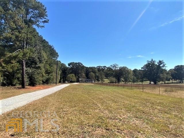 228 B Hosannah Road Locust Grove, GA 30248 - Photo 1 of 1 a view of an outdoor space and a yard