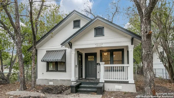 a front view of a house with a porch