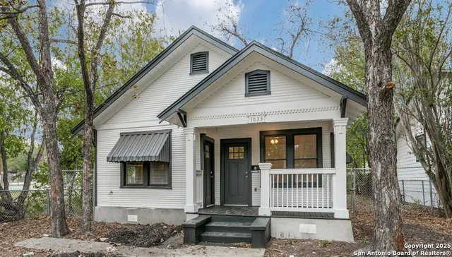 a front view of a house with a porch