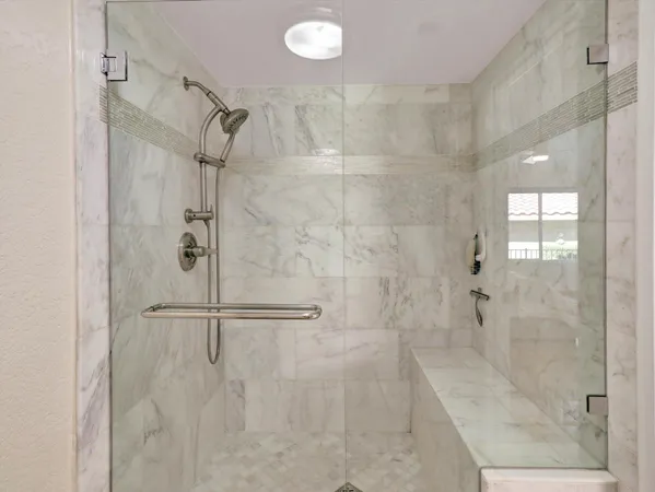 a patio with water table and chairs