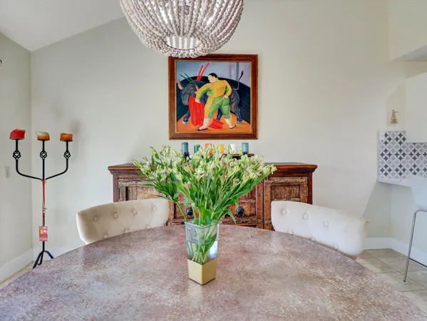 a vase with flowers on a table