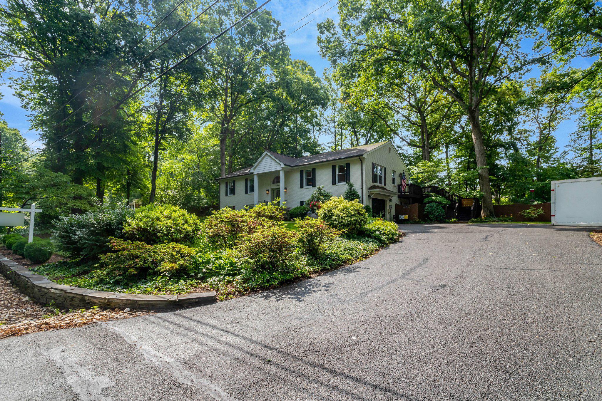 7506 Oriole Avenue Springfield, VA 22150 - Photo 60 of 67 front view of a house with a yard