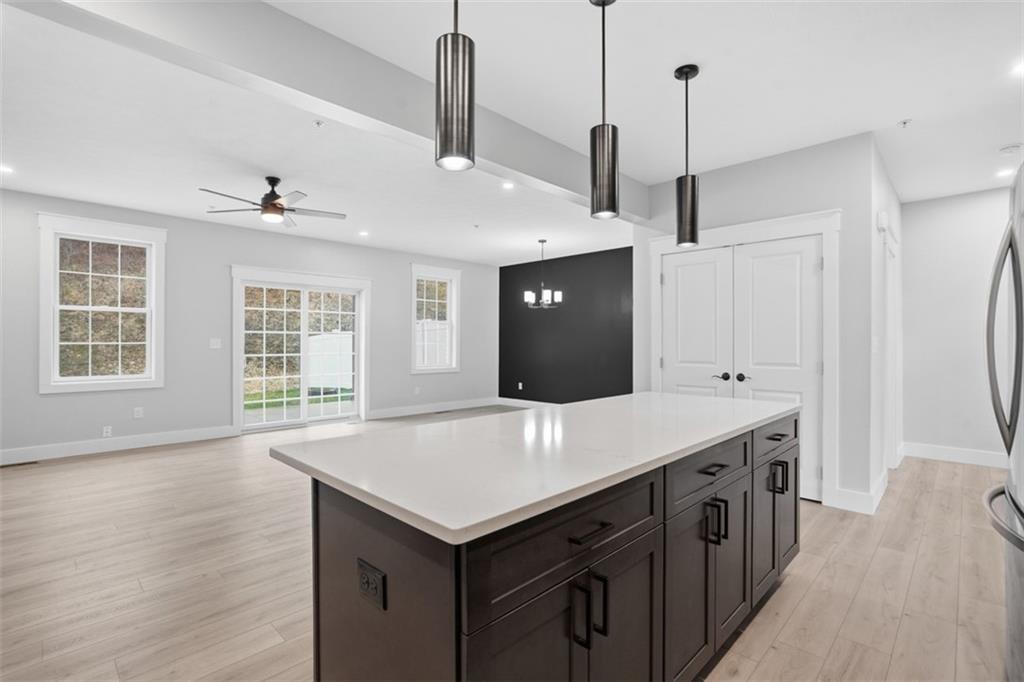 2339 Old Greentree Road Carnegie, PA 15106 - Photo 13 of 48 a kitchen with a stove a refrigerator a sink and wooden floors