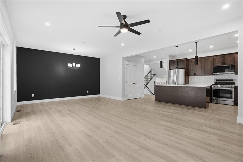 2339 Old Greentree Road Carnegie, PA 15106 - Photo 17 of 48 a view of empty room with wooden floor and a ceiling fan