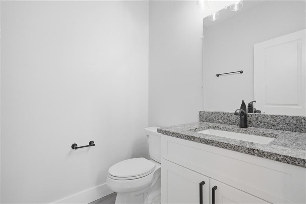 2339 Old Greentree Road Carnegie, PA 15106 - Photo 22 of 48 a bathroom with a granite countertop sink and toilet