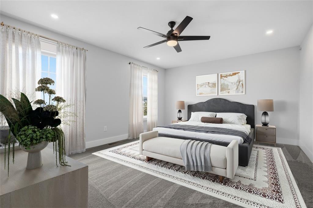 2339 Old Greentree Road Carnegie, PA 15106 - Photo 29 of 48 a bedroom with a large bed and a potted plant