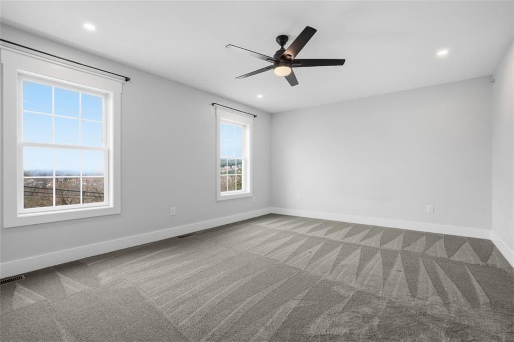 2339 Old Greentree Road Carnegie, PA 15106 - Photo 30 of 48 a view of a livingroom with a ceiling fan and window