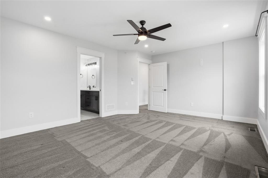 2339 Old Greentree Road Carnegie, PA 15106 - Photo 32 of 48 a view of empty room with wooden floor and ceiling fan