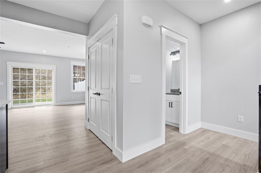 2339 Old Greentree Road Carnegie, PA 15106 - Photo 4 of 48 an empty room with wooden floor and windows