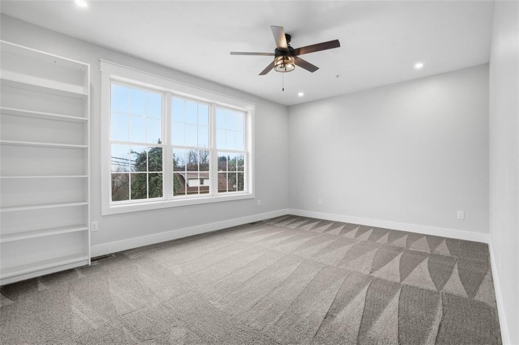 2339 Old Greentree Road Carnegie, PA 15106 - Photo 6 of 48 a view of an empty room with a window