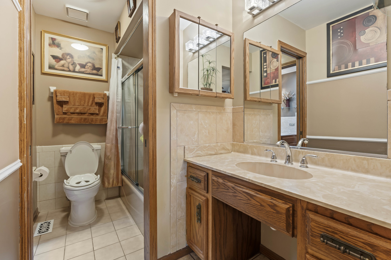 3686 Ronald Road Crete, IL 60417 - Photo 16 of 35 a bathroom with a sink a toilet and shower