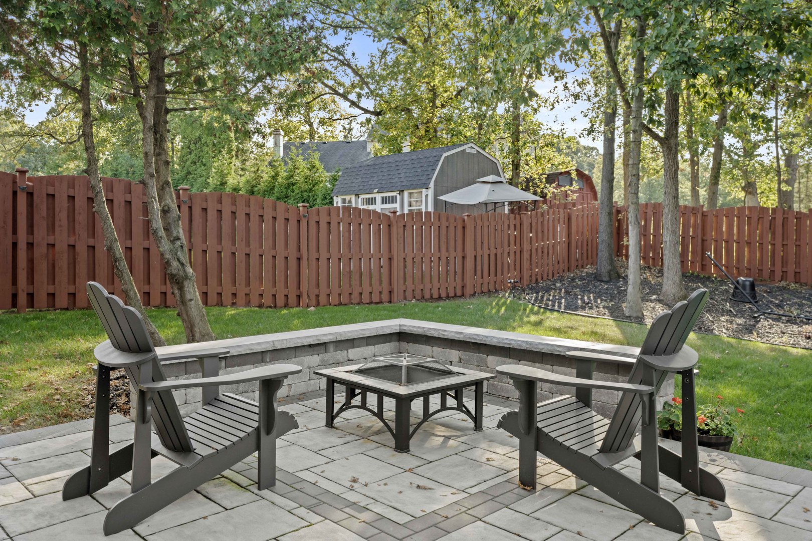 3686 Ronald Road Crete, IL 60417 - Photo 25 of 35 a backyard of a house with table and chairs
