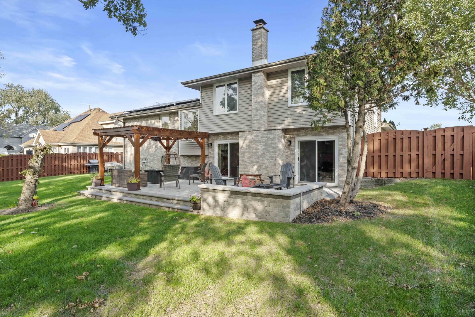 3686 Ronald Road Crete, IL 60417 - Photo 26 of 35 a view of a house with a yard and sitting area